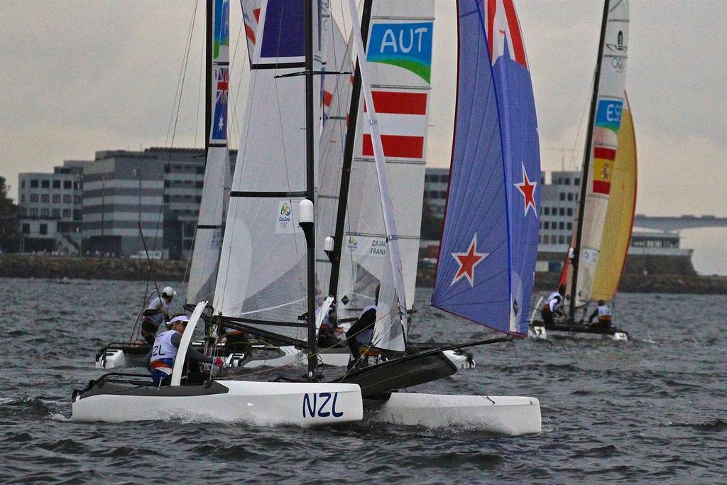 Gemma Jones and Jason Saunders  (NZL) soon after rounding mark 1 in the Nacra 17 © Richard Gladwell www.photosport.co.nz